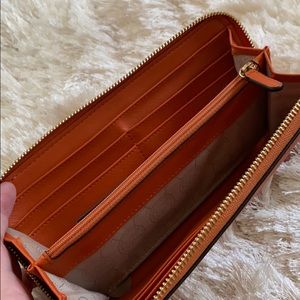 Michael Kors Bags - Michael Kors Orange Large Wallet Michael Kors Bags - Michael Kors Orange Large Wallet